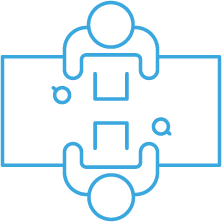 Two people sitting across from each other at a table